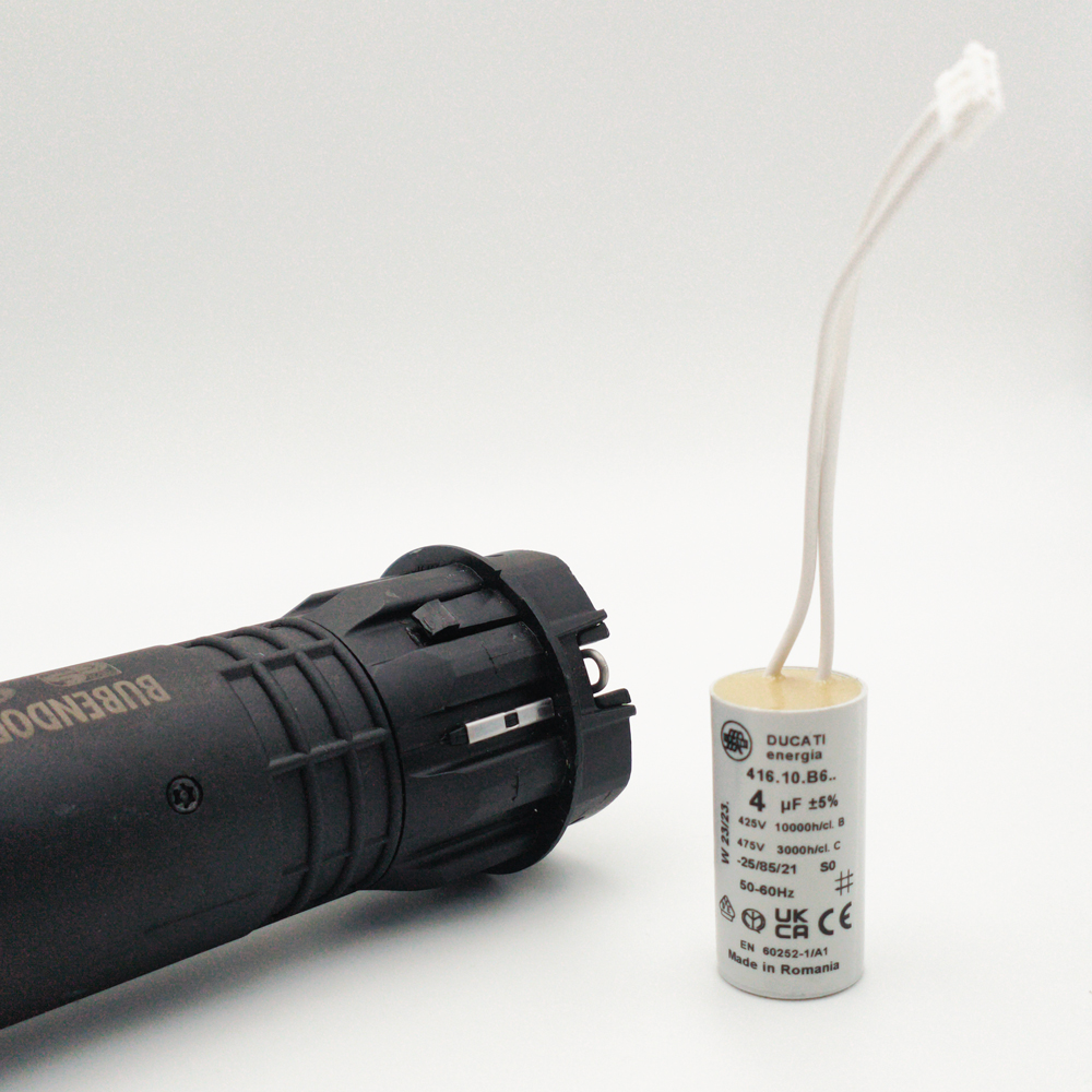 Représente un condensateur avec un moteur de volet